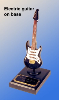 miniature Guitar as a paper weight