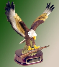 Flying Eagle holding an M 1 Garand Rifle