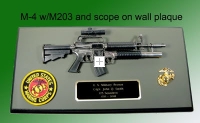 M-4 rifle with M203 launcher on wall plaque