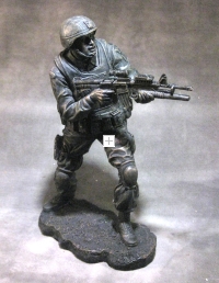 statue of soldier standing no base