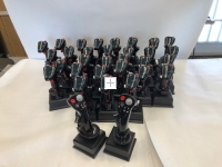 group of F-16 stick grips on base