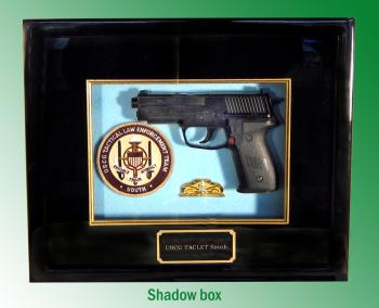 Shadow box with gun