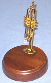 miniature trumpet on rd wood base