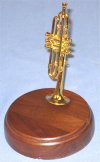 miniature trumpet on rd wood base