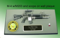 M-4 rifle with M203 launcher on wall plaque