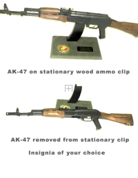 AK-47 rifle on wood base