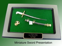 Miniature sword presentation plaque