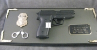 Police award gun plaque--