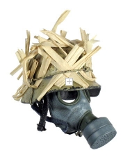 German helmet with grass camo and gas mask