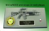 M-4 rifle with M203 launcher on wall plaque